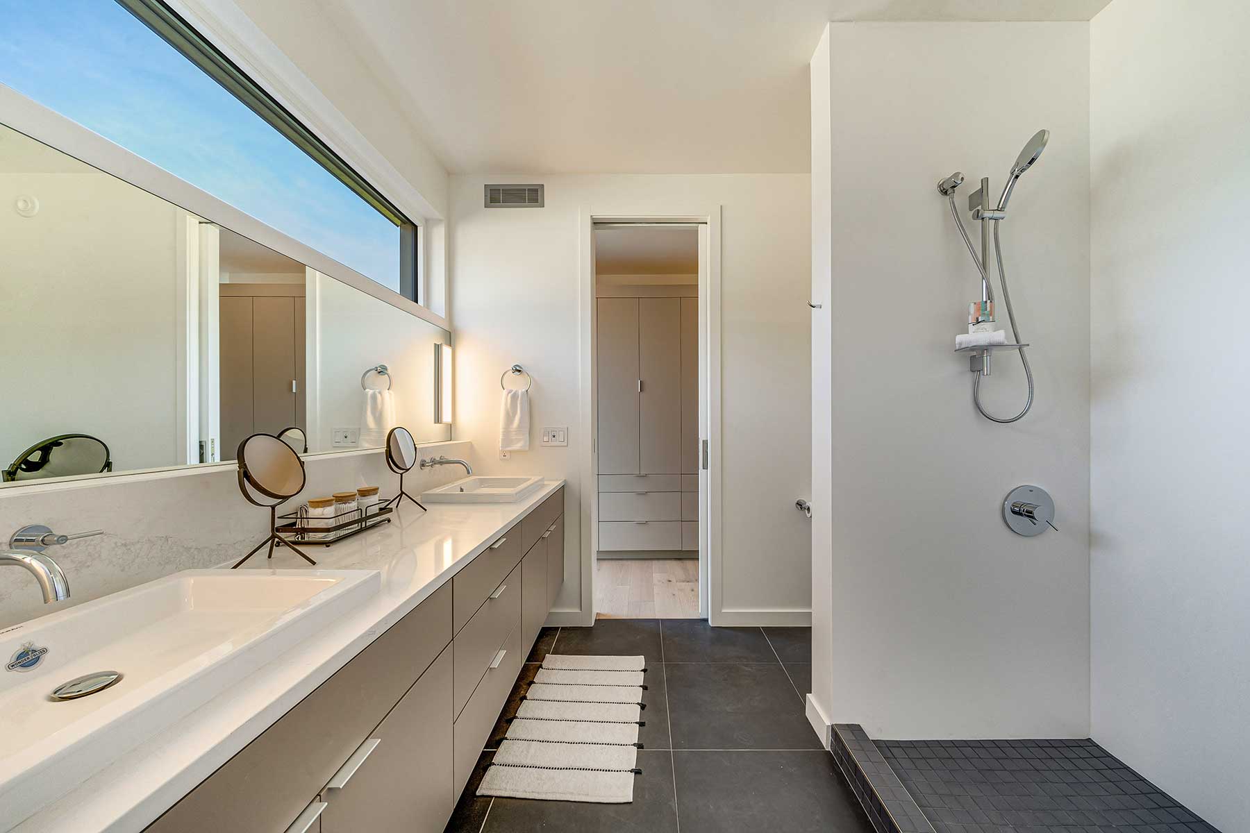 A modern bathroom inside a luxury modular home.